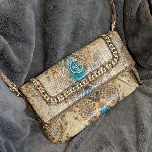 Gianni Bini foldover clutch bag in a brown and blue snake print